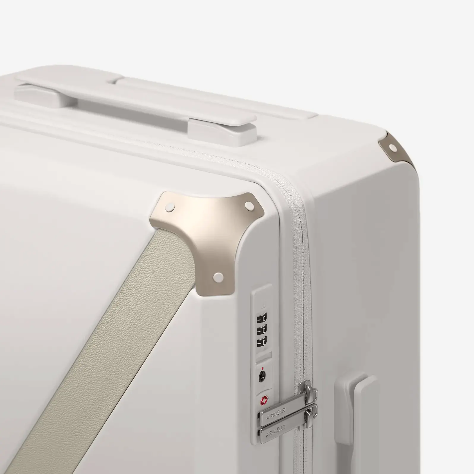 Beige hard shell luggage, The Cabin Trunk Essential by Armoir, corner detail