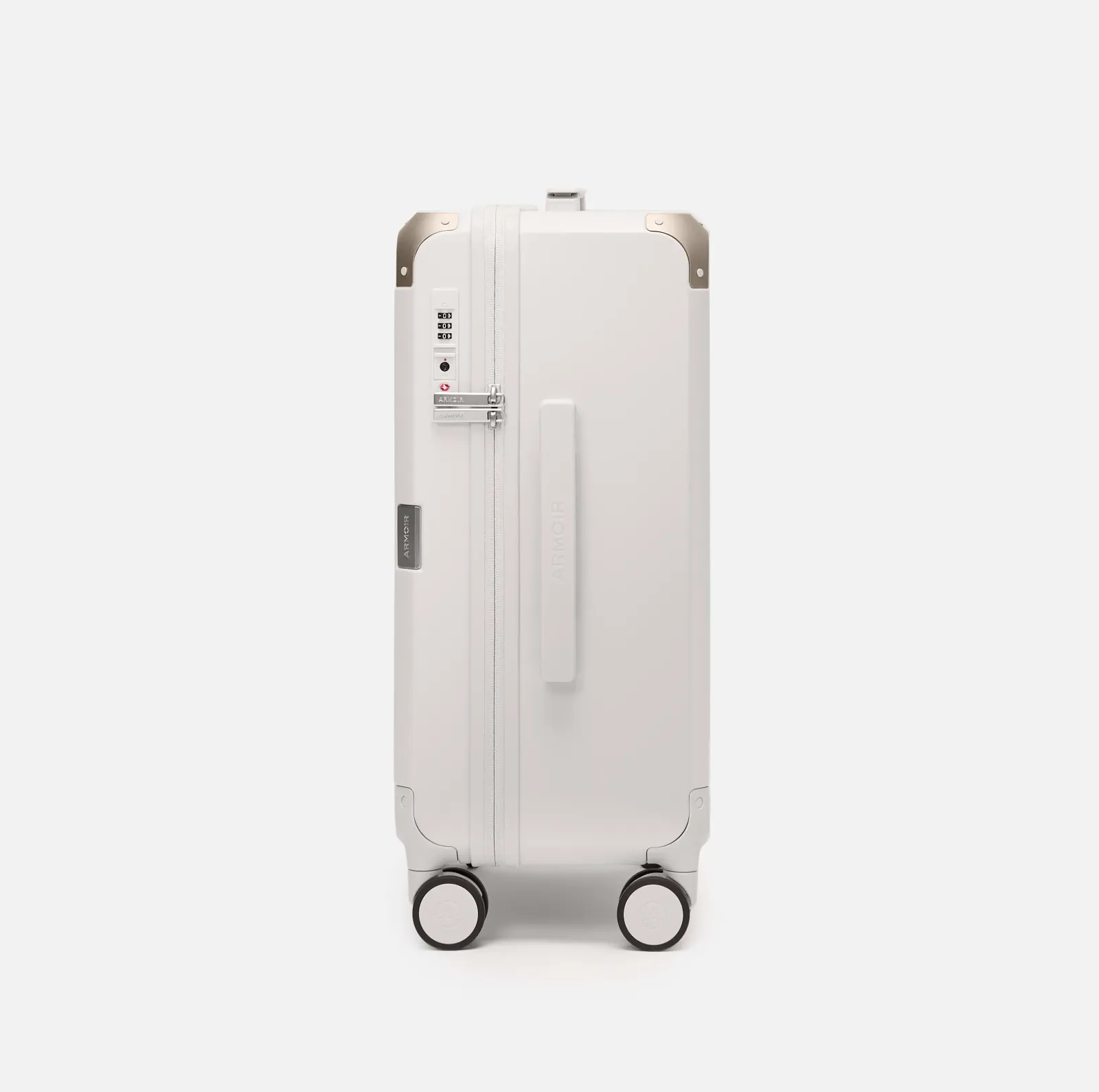 Beige carry-on suitcase, The Cabin Trunk Essential by Armoir, side profile