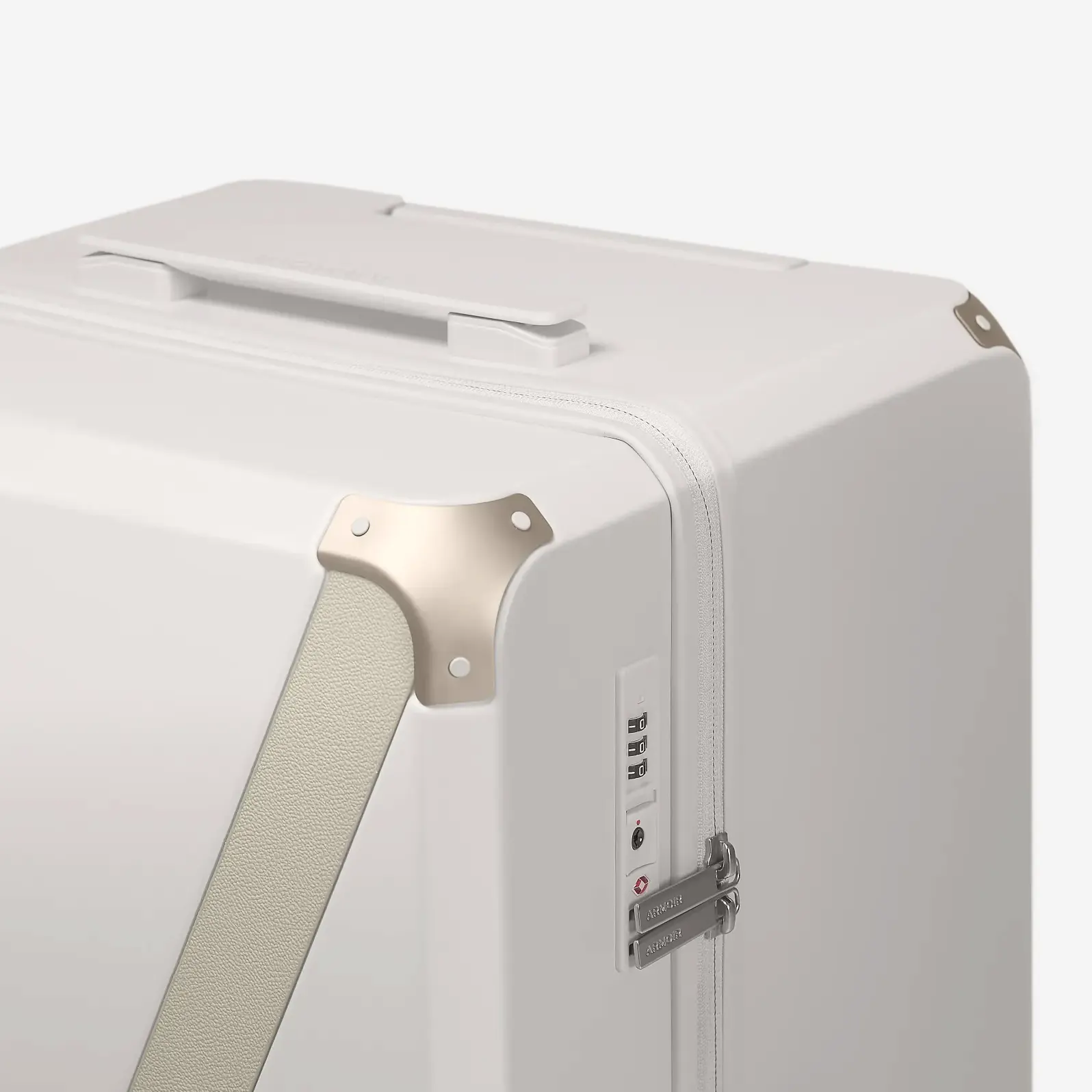 Beige hard shell luggage, The Large Trunk Essential by Armoir, corner detail